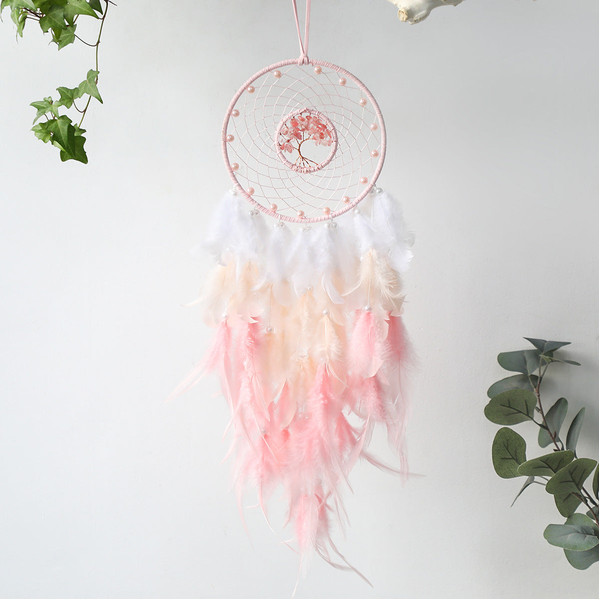 Attrape rêves plumes rose