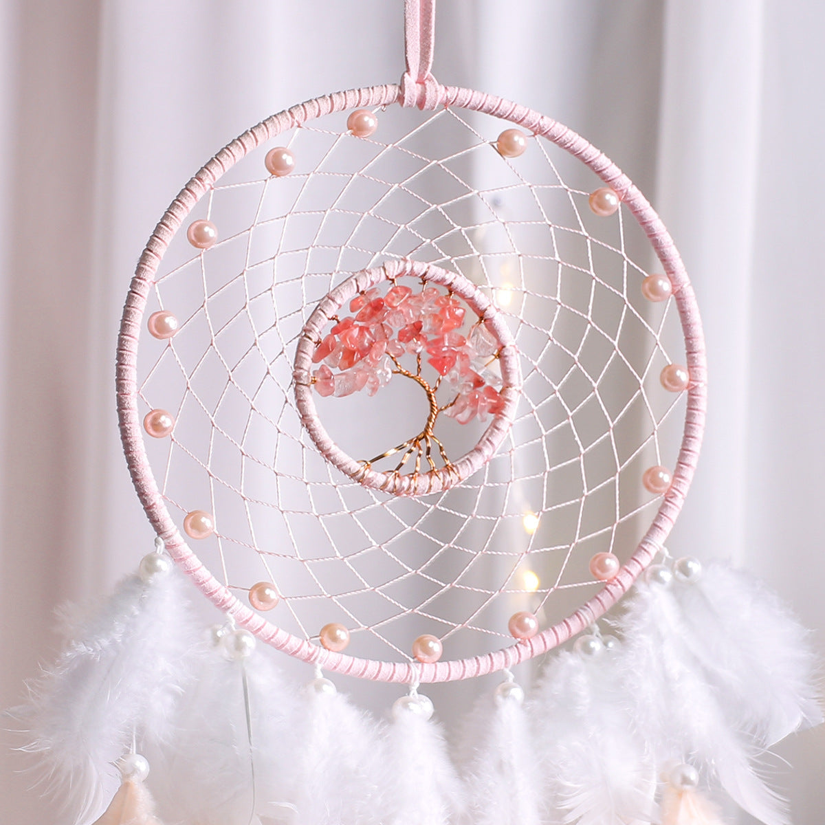 Attrape rêves plumes rose