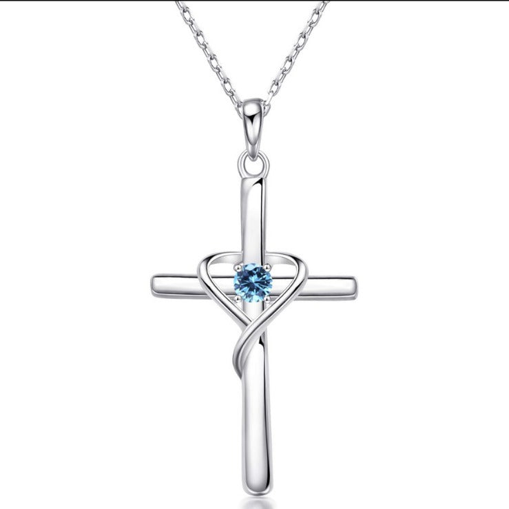 Collier pendentif croix en forme de cœur